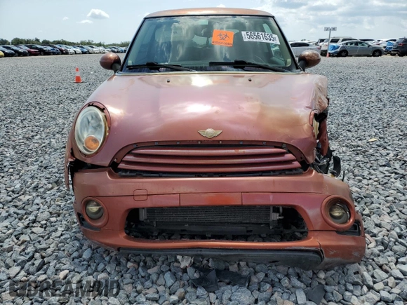 2011 MINI Hardtop with VIN WMWSU3C52BT094399, listed as a Copart auction lot 56561635 with 94,428 mi miles and Salvage Title. Bid and sale history available at DreamBid. Image 5.