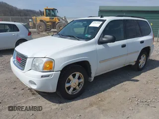 2008 GMC Envoy SLE2 with VIN 1GKDT13S682112642, listed as a IAAI auction lot 42062008 with 162,467 mi miles. Bid and sale history available at carsss.com. Image 2.