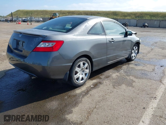 2009 Honda Civic Cpe LX with VIN 2HGFG12699H540664, listed as a IAAI auction lot 42100966 with Not Provided miles. Bid and sale history available at carsss.com. Image 4.
