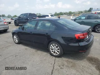 2015 Volkswagen Jetta SE with VIN 3VWD17AJ1FM349301, listed as a Copart auction lot 58963255 with 156,480 mi miles and Salvage title. Bid and sale history available at DreamBid. Image 2.