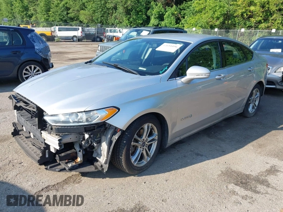 2016 Ford Fusion SE Hybrid z VIN 3FA6P0LU6GR121605, wystawiony jako IAAI lot #42651096 z przebiegiem 194 693 mil mil oraz . Historia ofert i sprzedaży dostępna na DreamBid. Obrazek 2.