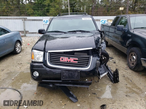 2004 GMC Envoy SLT with VIN 1GKDT13S942279670, listed as a Copart auction lot 73527974 with 120,425 mi miles and Salvage Title. Bid and sale history available at DreamBid. Image 5.