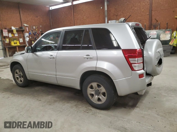 2012 Suzuki Grand Vitara Premium z VIN JS3TD0D2XC4100425, wystawiony jako Copart lot #49080815 z przebiegiem 108 780 mil mil oraz Szkody całkowita. Historia ofert i sprzedaży dostępna na DreamBid. Obrazek 2.