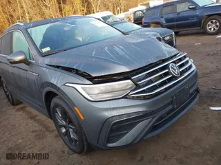 2022 Volkswagen Tiguan SE with VIN 3VV2B7AX9NM027422, listed as a IAAI auction lot 40736336 with 25,876 mi miles. Bid and sale history available at carsss.com. Image 1.
