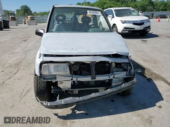1991 Geo Tracker z VIN 2CNBJ18U3M6909006, wystawiony jako Copart lot #73638944 z przebiegiem 65 033 mil mil oraz Tytuł czysty. Historia ofert i sprzedaży dostępna na DreamBid. Obrazek 10.