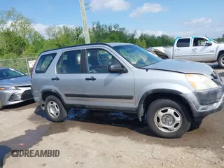 2003 Honda CR-V LX z VIN JHLRD68493C008030, wystawiony jako IAAI lot #42034191 z przebiegiem 290 596 mil mil oraz . Historia ofert i sprzedaży dostępna na DreamBid. Obrazek 13.