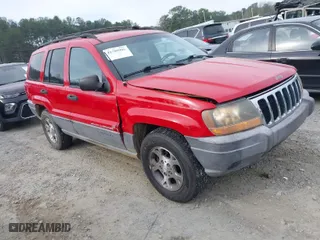 1999 Jeep Grand Cherokee Laredo with VIN 1J4GW58S0XC519908, listed as a IAAI auction lot 41789905 with 221,064 mi miles. Bid and sale history available at carsss.com. Image 1.