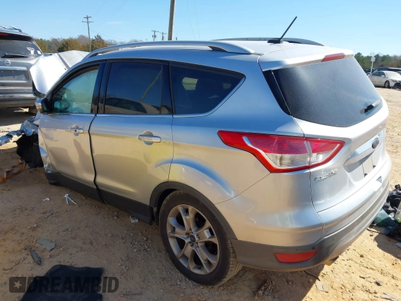 2015 Ford Escape Titanium with VIN 1FMCU0JX2FUB70760, listed as a IAAI auction lot 41649089 with 1 mi miles. Bid and sale history available at carsss.com. Image 3.