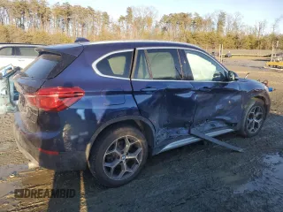 2018 BMW X1 xDrive28i with VIN WBXHT3C32J3H31391, listed as a Copart auction lot 88584855 with 32,441 mi miles and Salvage Title. Bid and sale history available at DreamBid. Image 3.