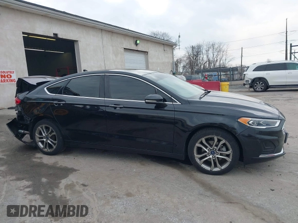 2019 Ford Fusion SEL with VIN 3FA6P0CD9KR237633, listed as a IAAI auction lot 41850201 with 68,157 mi miles. Bid and sale history available at carsss.com. Image 14.