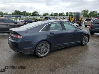 2013 Lincoln MKZ с VIN 3LN6L2G95DR828256, выставлен на аукционе Copart как лот 55645125 с пробегом 44 519 миль миль и Списание • Salvage title. История ставок и продаж доступна на DreamBid. Изображение 3.