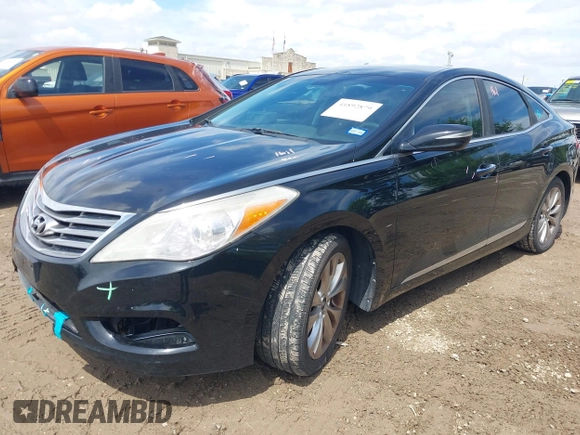 2014 Hyundai Azera with VIN KMHFG4JG3EA354276, listed as a IAAI auction lot 41892879 with 114,147 mi miles and . Bid and sale history available at carsss.com. Image 2.