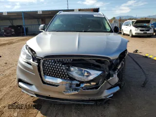 2020 Lincoln Aviator Reserve z VIN 5LM5J7XC2LGL35647, wystawiony jako Copart lot #71263444 z przebiegiem 56 792 mil mil oraz Szkoda całkowita • Salvage title. Historia ofert i sprzedaży dostępna na DreamBid. Obrazek 5.