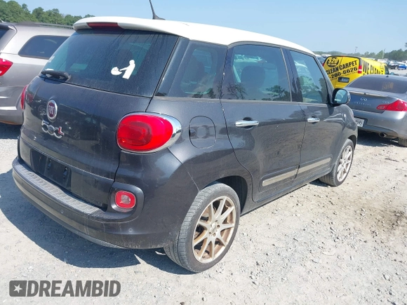 2014 FIAT 500L Lounge with VIN ZFBCFACHXEZ005568, listed as a IAAI auction lot 42802980 with 130,508 mi miles and . Bid and sale history available at DreamBid. Image 4.