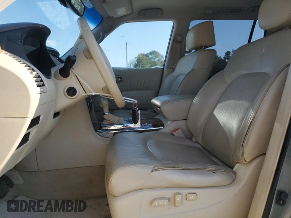 2011 Infiniti QX56 7-passenger with VIN JN8AZ2NE8B9006786, listed as a Copart auction lot 74598254 with 164,074 mi miles and Salvage Title. Bid and sale history available at carsss.com. Image 7.