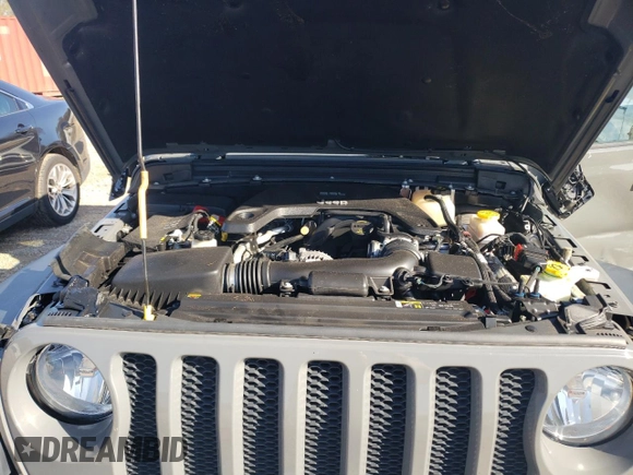2020 Jeep Wrangler Willys with VIN 1C4GJXAG5LW307083, listed as a Copart auction lot 86994744 with 28,873 mi miles and Salvage title. Bid and sale history available at DreamBid. Image 14.