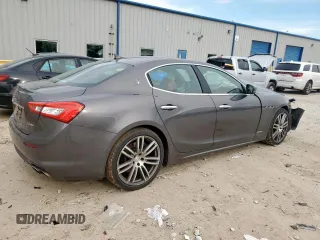 2018 Maserati Ghibli S Q4 GranLusso z VIN ZAM57YTL8J1265648, wystawiony jako Copart lot #56295795 z przebiegiem 51 857 mil mil oraz Szkoda całkowita • Salvage title. Historia ofert i sprzedaży dostępna na DreamBid. Obrazek 3.