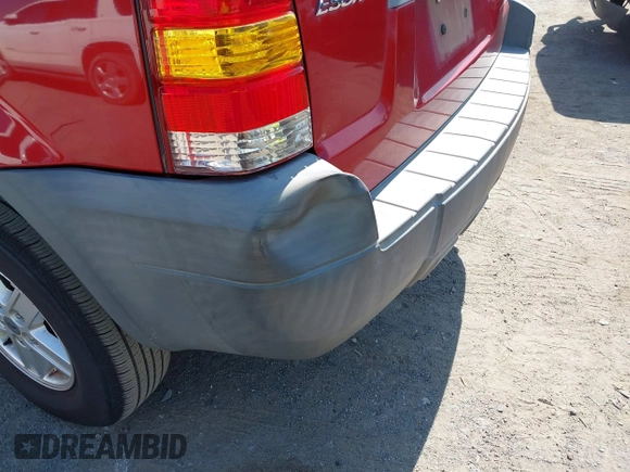 2006 Ford Escape XLS z VIN 1FMYU02Z96KA47068, wystawiony jako IAAI lot #42588037 z przebiegiem 139 581 mil mil oraz . Historia ofert i sprzedaży dostępna na DreamBid. Obrazek 13.