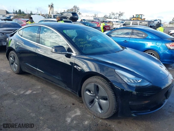 2018 Tesla Model 3 Long Range Battery with VIN 5YJ3E1EA9JF173461, listed as a IAAI auction lot 41777635 with 58579 miles. Bid and sale history available at carsss.com. Image 1.