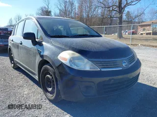 2009 Nissan Versa 1.8 SL with VIN 3N1BC13E89L490056, listed as a IAAI auction lot 41659810 with 170,335 mi miles. Bid and sale history available at carsss.com. Image 6.