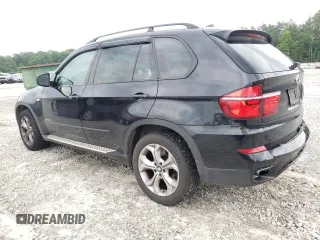 2011 BMW X5 50i with VIN 5UXZV8C52BL419028, listed as a Copart auction lot 59870505 with 126,666 mi miles and Salvage title. Bid and sale history available at DreamBid. Image 2.