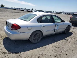 2005 Ford Taurus SE with VIN 1FAFP53U25A303516, listed as a Copart auction lot 63250505 with 203,463 mi miles and Salvage title. Bid and sale history available at DreamBid. Image 3.