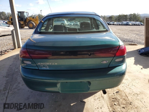 1997 Ford Escort LX with VIN 1FALP13P8VW200707, listed as a Copart auction lot 86647484 with 74,807 mi miles and Salvage Title. Bid and sale history available at carsss.com. Image 6.