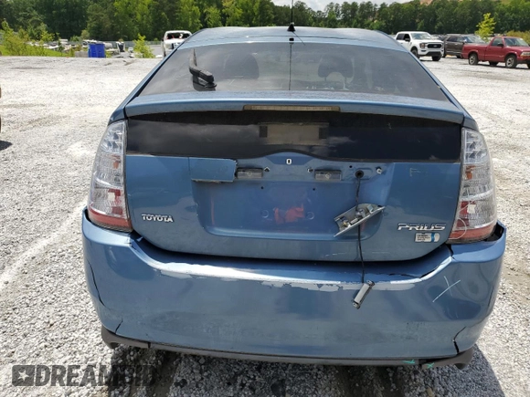 2007 Toyota Prius с VIN JTDKB20UX77690407, выставлен на аукционе Copart как лот 60980445 с пробегом 108 686 миль миль и Списание • Salvage title. История ставок и продаж доступна на DreamBid. Изображение 6.