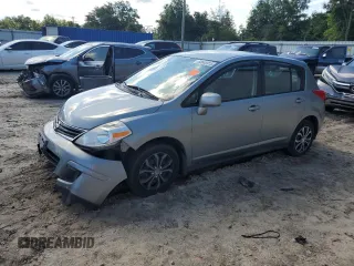 2011 Nissan Versa S with VIN 3N1BC1CP3BL406961, listed as a Copart auction lot 60648915 with 147,175 mi miles and Salvage title. Bid and sale history available at DreamBid. Image 1.
