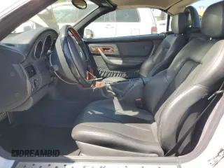 2001 Mercedes-Benz SLK-Class with VIN WDBKK65F81F210099, listed as a Copart auction lot 52606105 with 129,849 mi miles and Salvage Title. Bid and sale history available at carsss.com. Image 7.