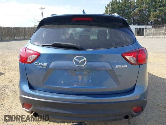 2015 Mazda CX-5 Grand Touring with VIN JM3KE4DY5F0469098, listed as a IAAI auction lot 41858792 with 174,883 mi miles. Bid and sale history available at carsss.com. Image 17.