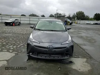 2020 Toyota Prius L Eco с VIN JTDKARFU1L3121224, выставлен на аукционе Copart как лот 56697845 с пробегом 94 621 миль миль и Списание • Salvage title. История ставок и продаж доступна на DreamBid. Изображение 13.