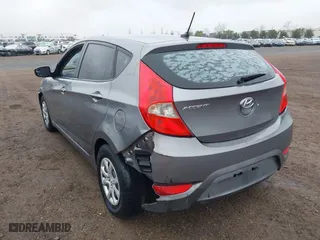 2014 Hyundai Accent GS with VIN KMHCT5AE3EU176306, listed as a IAAI auction lot 41572325 with 179,277 mi miles. Bid and sale history available at carsss.com. Image 6.
