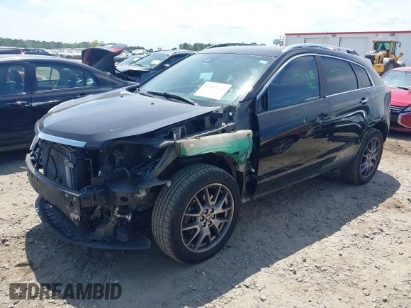 2015 Cadillac SRX Performance Collection with VIN 3GYFNCE30FS549872, listed as a IAAI auction lot 42201529 with 125,128 mi miles and . Bid and sale history available at DreamBid. Image 2.