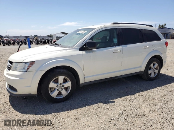 2013 Dodge Journey American Value with VIN 3C4PDCAB2DT547459, listed as a Copart auction lot 61217605 with 116,740 mi miles and Clean title. Bid and sale history available at DreamBid. Image 1.