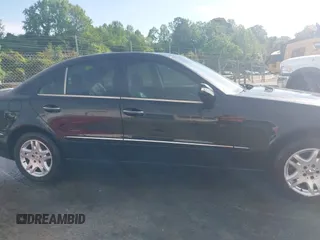 2003 Mercedes-Benz E-Class 3.2L with VIN WDBUF65J93X110625, listed as a IAAI auction lot 41485310 with 164,165 mi miles. Bid and sale history available at carsss.com. Image 13.