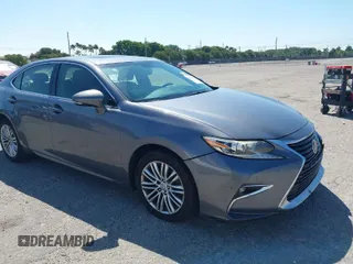 2016 Lexus ES 350 with VIN JTHBK1GG4G2219925, listed as a IAAI auction lot 41894213 with 137,306 mi miles. Bid and sale history available at carsss.com. Image 1.