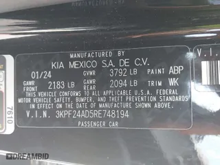 2024 Kia Forte LXS with VIN 3KPF24AD5RE748194, listed as a IAAI auction lot 42011387 with 32,543 mi miles. Bid and sale history available at carsss.com. Image 9.