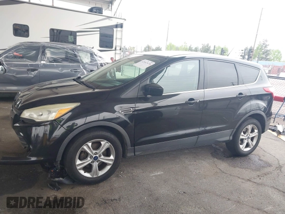 2015 Ford Escape SE with VIN 1FMCU0GXXFUC80317, listed as a IAAI auction lot 42047476 with 230,381 mi miles and . Bid and sale history available at DreamBid. Image 13.