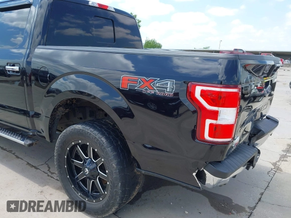2019 Ford F-150 XL with VIN 1FTEW1E59KKE90346, listed as a IAAI auction lot 42188308 with 130,992 mi miles and . Bid and sale history available at DreamBid. Image 18.