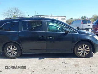 2014 Honda Odyssey EX-L with VIN 5FNRL5H68EB102286, listed as a IAAI auction lot 42148323 with 160,446 mi miles and . Bid and sale history available at carsss.com. Image 13.
