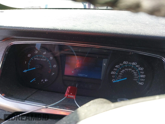 2013 Ford Taurus SEL with VIN 1FAHP2E83DG224780, listed as a IAAI auction lot 41675601 with 166,977 mi miles. Bid and sale history available at carsss.com. Image 7.