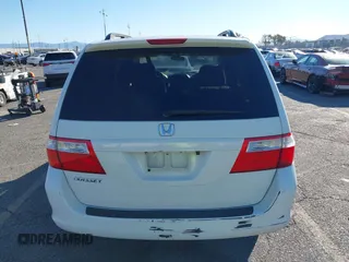 2006 Honda Odyssey EX z VIN 5FNRL38486B410286, wystawiony jako IAAI lot #41641433 z przebiegiem 145 312 mil mil oraz . Historia ofert i sprzedaży dostępna na DreamBid. Obrazek 16.