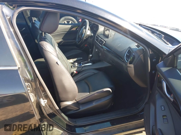 2014 Mazda 3 i Grand Touring z VIN JM1BM1M78E1159912, wystawiony jako IAAI lot #42079661 z przebiegiem 105 039 mil mil oraz . Historia ofert i sprzedaży dostępna na DreamBid. Obrazek 5.