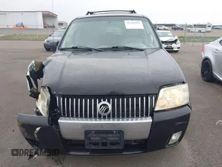 2005 Mercury Mariner Luxury z VIN 4M2CU57115DJ33938, wystawiony jako IAAI lot #42162155 z przebiegiem 174 834 mil mil oraz . Historia ofert i sprzedaży dostępna na DreamBid. Obrazek 12.