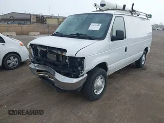2013 Ford Econoline Cargo Commercial with VIN 1FTNE2EW9DDA82065, listed as a IAAI auction lot 42073299 with 259,758 mi miles and . Bid and sale history available at DreamBid. Image 2.