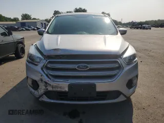 2017 Ford Escape SE z VIN 1FMCU9G99HUF01057, wystawiony jako Copart lot #60351695 z przebiegiem Nie podano mil oraz Czysty tytuł • Clean title. Historia ofert i sprzedaży dostępna na DreamBid. Obrazek 5.