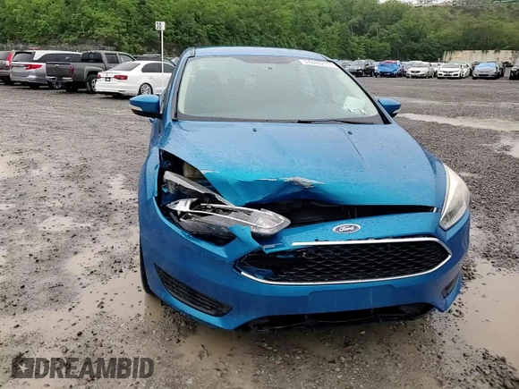 2016 Ford Focus SE z VIN 1FADP3F25GL208056, wystawiony jako Copart lot #57846215 z przebiegiem 127 239 mil mil oraz Szkoda całkowita • Salvage title. Historia ofert i sprzedaży dostępna na DreamBid. Obrazek 14.