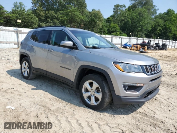 2019 Jeep Compass Latitude with VIN 3C4NJDBB3KT847058, listed as a Copart auction lot 60698065 with 90,687 mi miles and Salvage title. Bid and sale history available at DreamBid. Image 4.