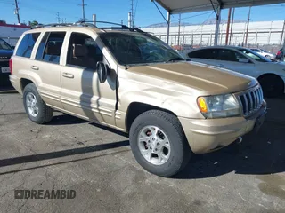 1999 Jeep Grand Cherokee Limited with VIN 1J4GW68NXXC727844, listed as a IAAI auction lot 41290773 with 222,838 mi miles. Bid and sale history available at carsss.com. Image 1.